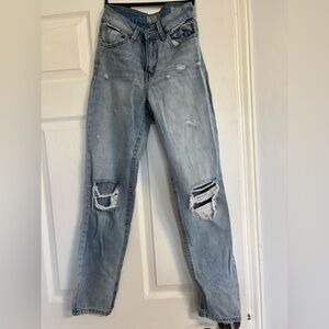 Straight leg ripped blue jeans